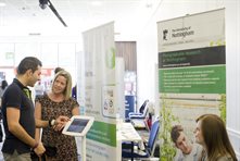 Student talking to an employer at a fair