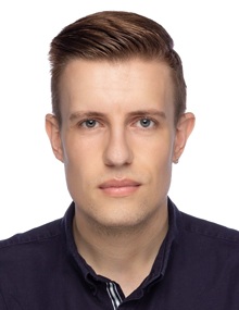Headshot of Jon Rowson against a white background