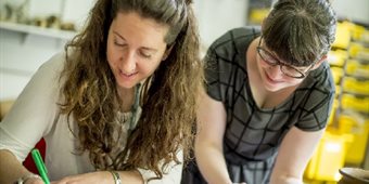 2-female-students-doing-research